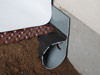 French Drain or Drain Tile system installed in a  crawl space
