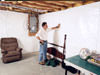 A basement wall covering for creating a vapor barrier on basement walls in 